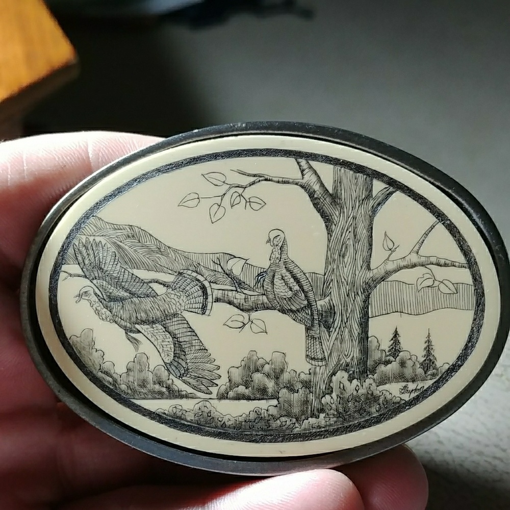 NWTF belt buckle and Smith and Wesson knife